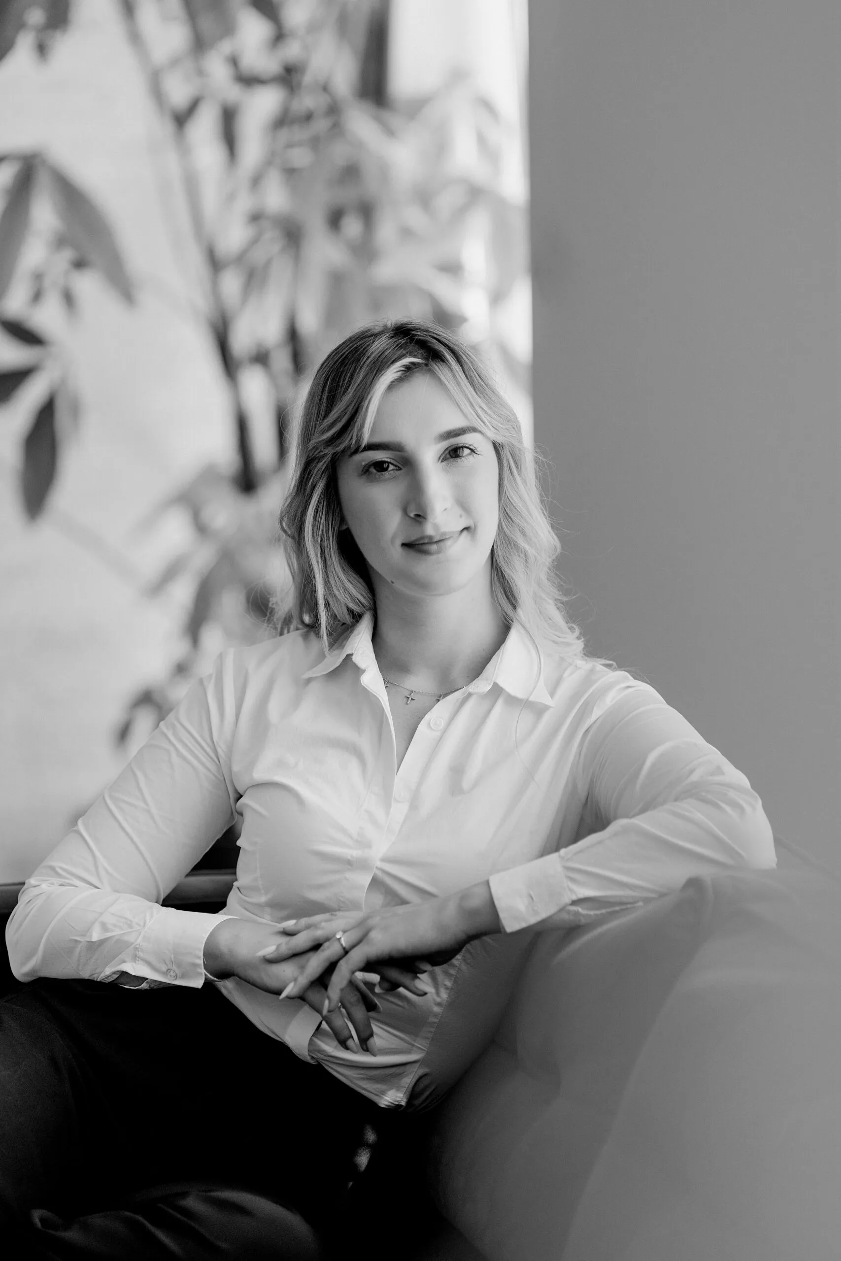 Miruna Zamfiriu seated, photographed in black and white